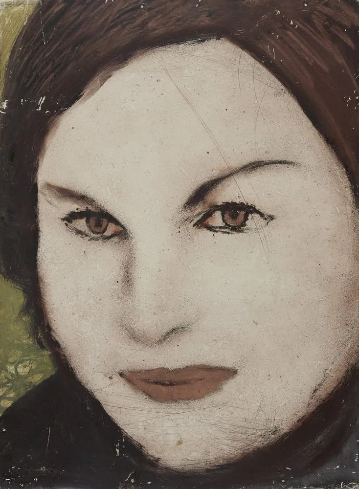 Hilarion Manero, Copper Face, 2000: painting of a woman's face with dark hair and red lips in close-up