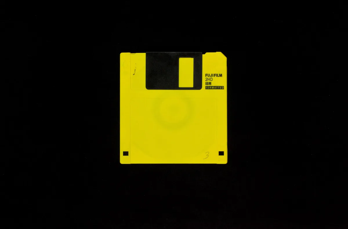 2-8 Van Gogh (date unknown): a yellow 3.5-inch floppy disk on a black background